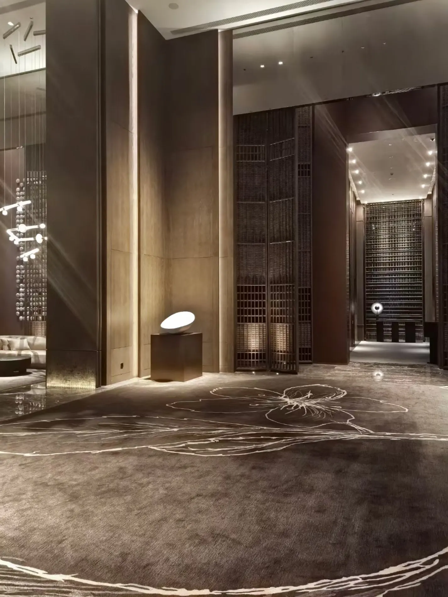 Decorative metal screens within a refined hospitality interior