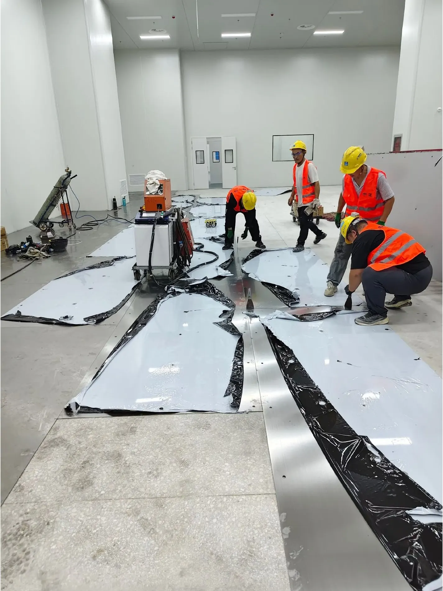 Custom metal elements being installed on site