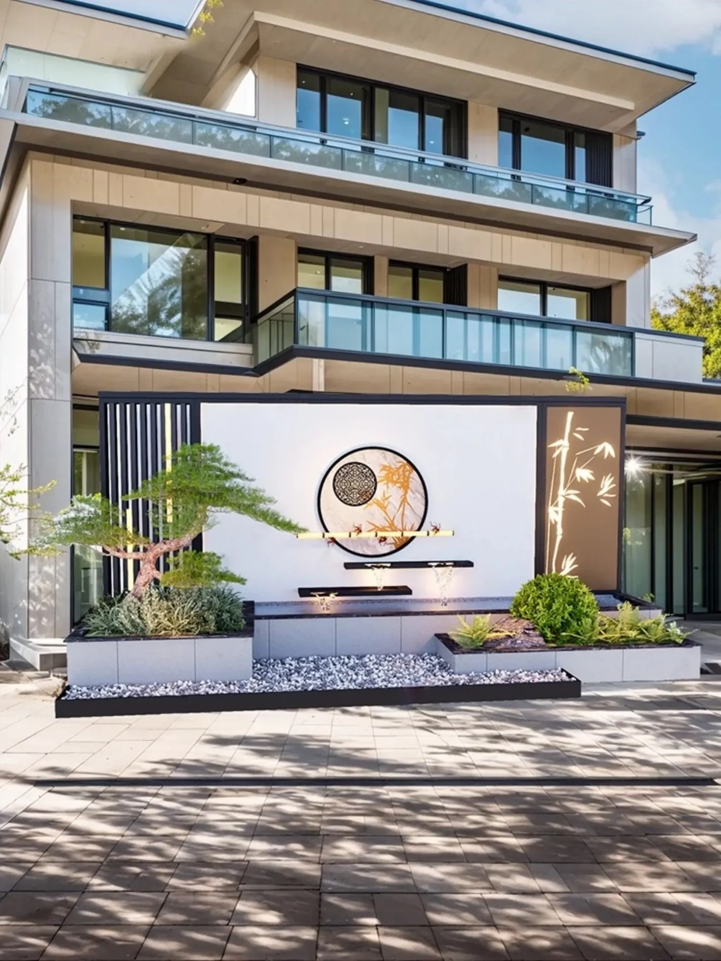 Villa entrance with integrated decorative screen and water feature